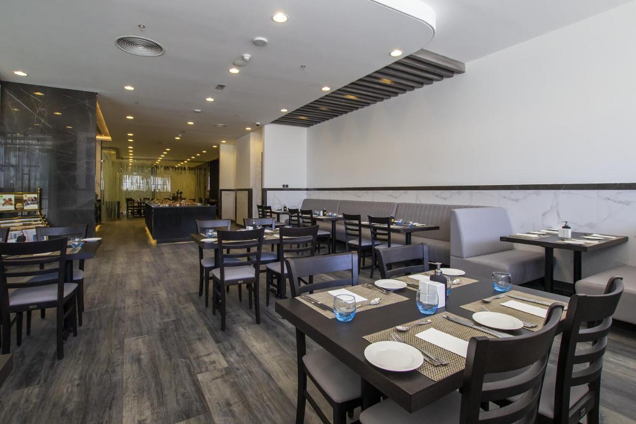 Time Onyx Hotel Apartments Dubai Esterno foto