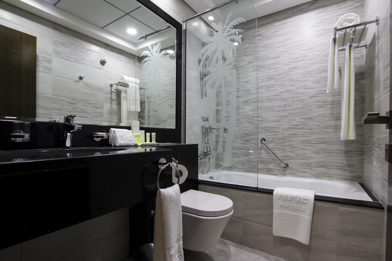 Time Onyx Hotel Apartments Dubai Esterno foto