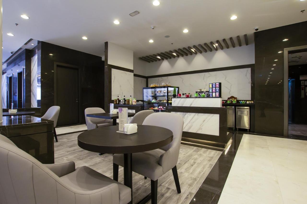 Time Onyx Hotel Apartments Dubai Esterno foto
