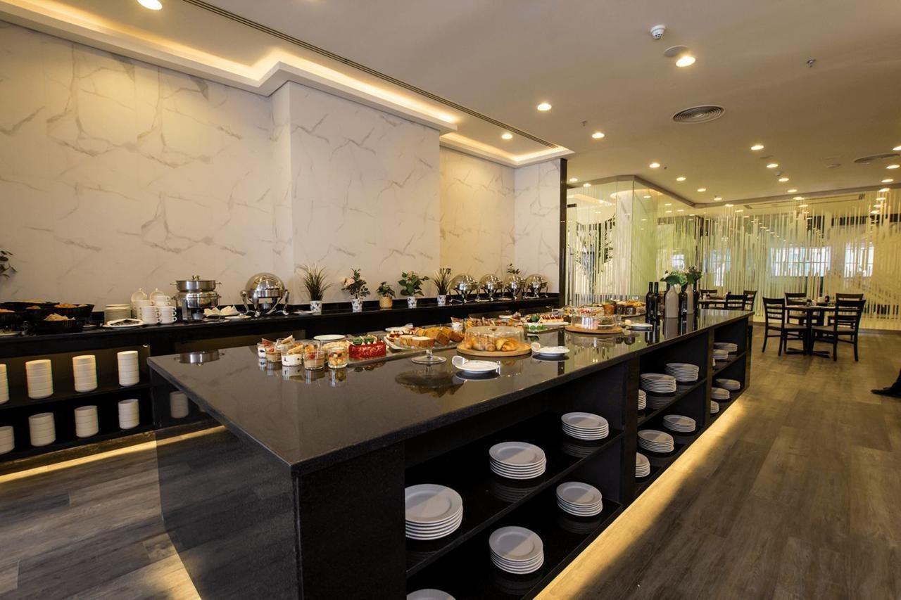 Time Onyx Hotel Apartments Dubai Esterno foto